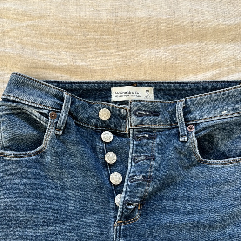 A&F high rise super skinny ankle jeans, cute button and ankle details